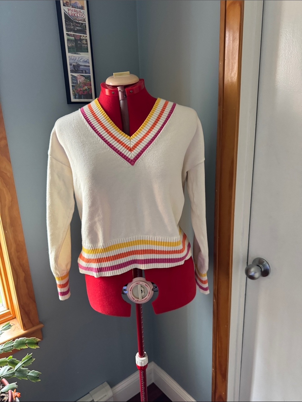 Cream V-Neck Sweater with Pink & Yellow Stripe Accents